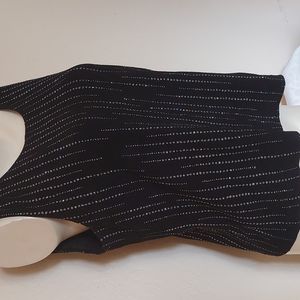 CONNECTED APPAREL sleeveless top.  Black background. Pre-owned great condition.